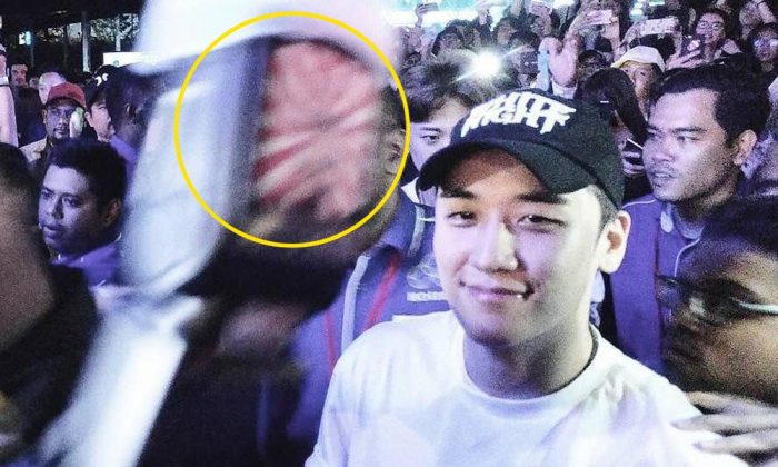 Сынри из BIGBANG попал под огонь критики из-за фотографии, которую он сделал в День независимости Кореи