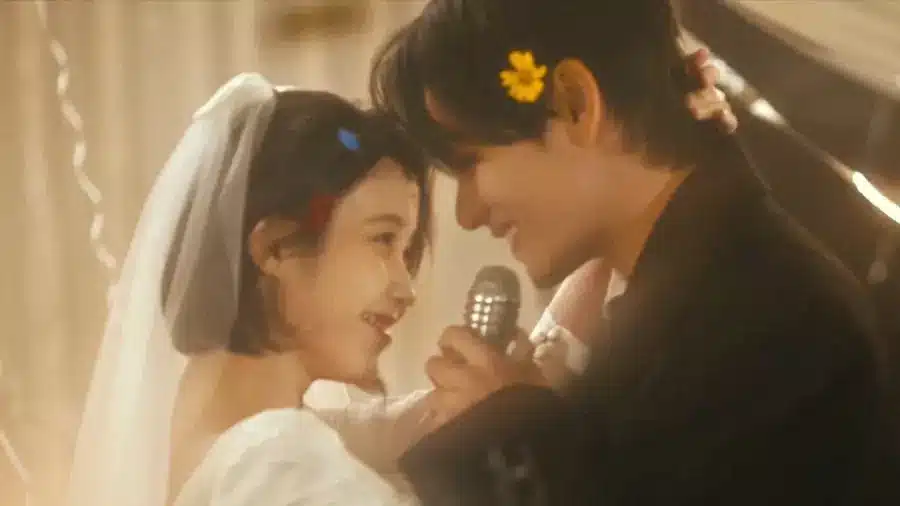 АйЮ и Ви из BTS рассказали трогательную историю любви в кинематографичном клипе «Love Wins All»